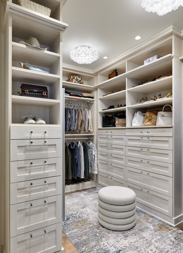 Inspiration for a mid-sized rustic closet remodel in Denver