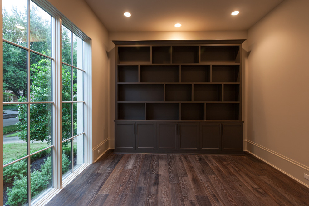 Large transitional dark wood floor home design photo in Houston with beige walls