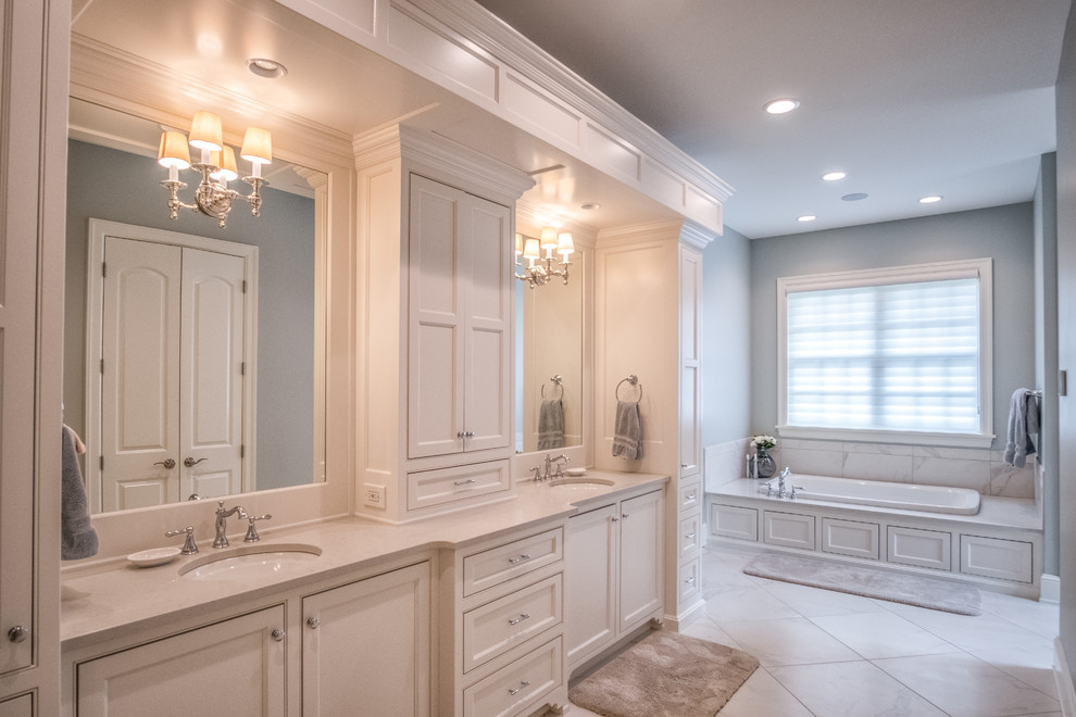 Alcove bathtub - large transitional master ceramic tile alcove bathtub idea with shaker cabinets, white cabinets, gray walls and an undermount sink
