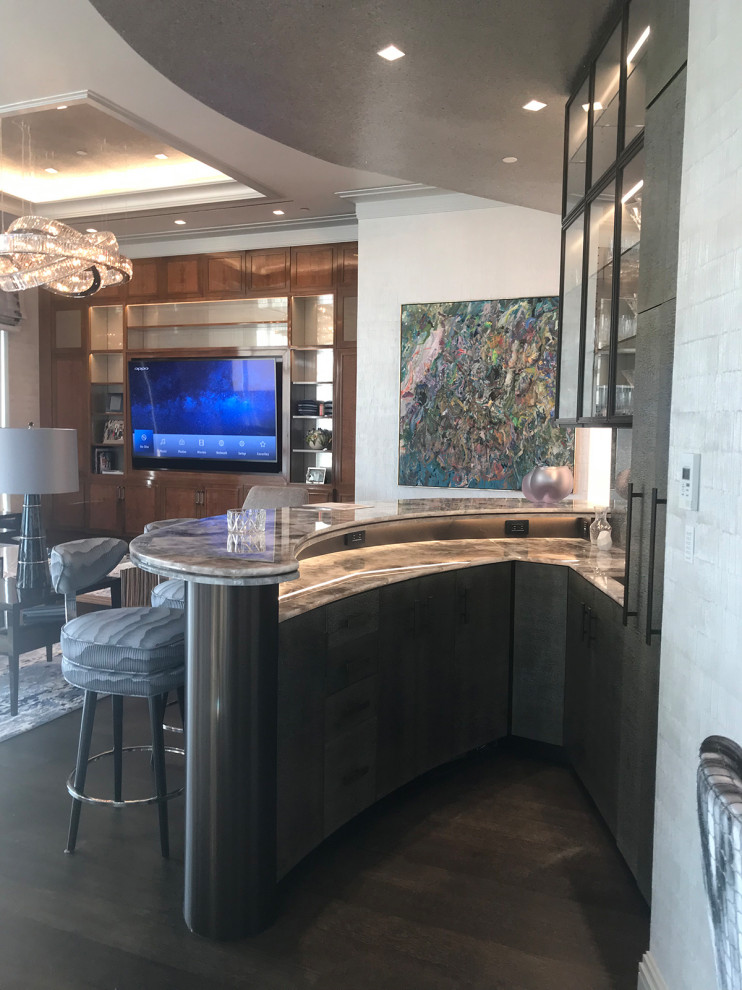 Design ideas for a mid-sized contemporary single-wall seated home bar in New York with an undermount sink, glass-front cabinets, dark wood cabinets, onyx benchtops, multi-coloured splashback, glass sheet splashback, porcelain floors, brown floor and multi-coloured benchtop.
