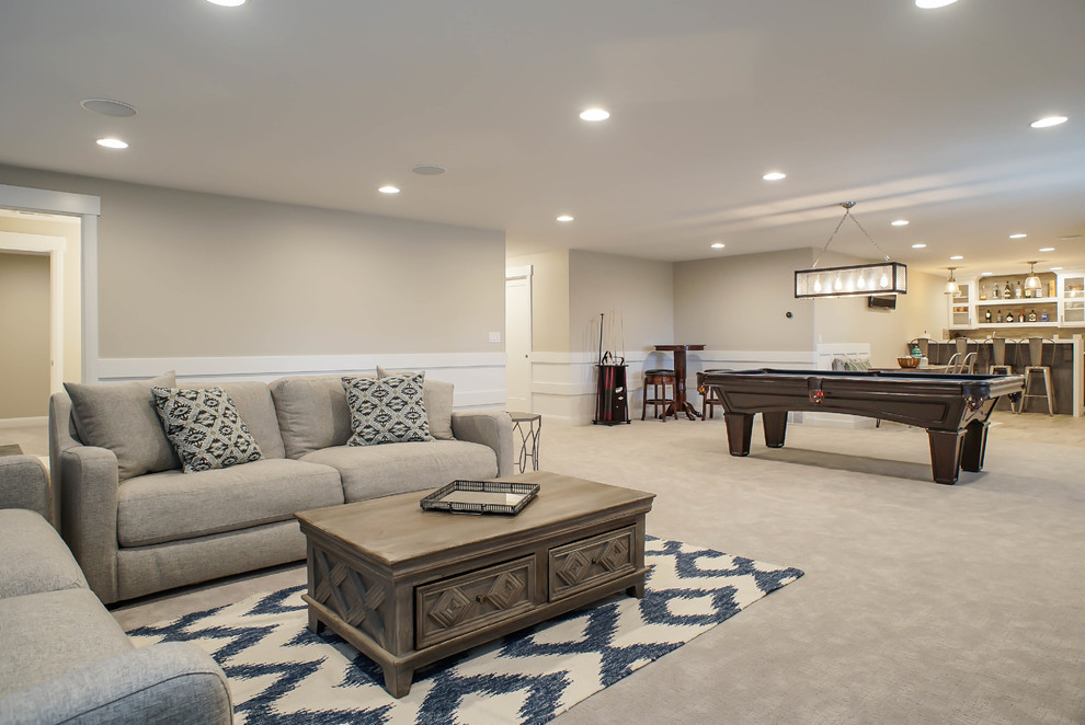 Photo of a large contemporary walk-out basement in Salt Lake City with beige walls, carpet, no fireplace and beige floor.