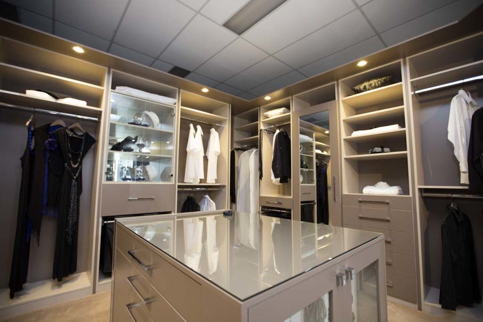 Design ideas for an expansive contemporary women's dressing room in Perth with open cabinets, grey cabinets and carpet.