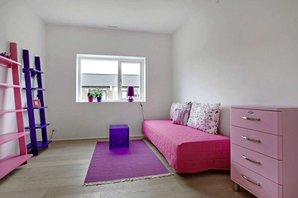 Inspiration for a mid-sized contemporary kids' room for girls in Aarhus.