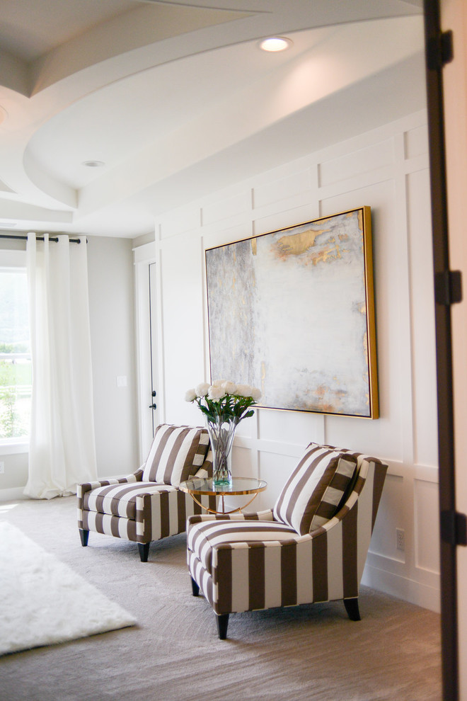 Example of a mid-sized transitional home design design in Seattle