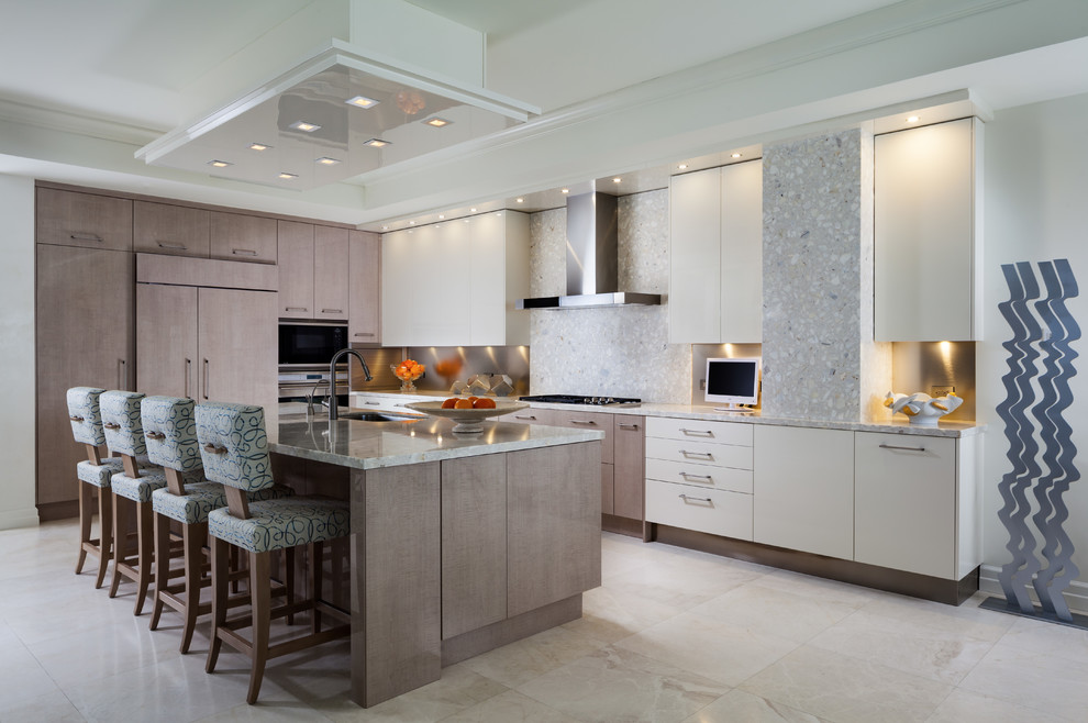 Inspiration for a large contemporary l-shaped open plan kitchen in Miami with beige floor, an undermount sink, flat-panel cabinets, medium wood cabinets, stone slab splashback, panelled appliances and with island.