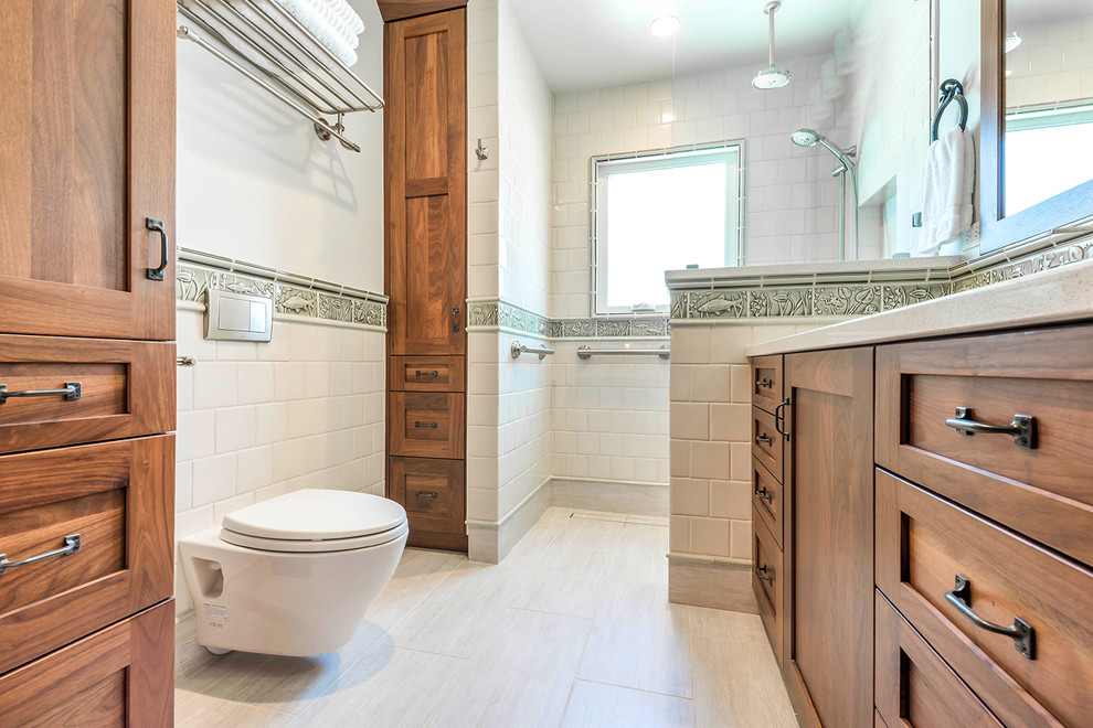 Mid-sized arts and crafts bathroom in San Francisco with shaker cabinets, brown cabinets, a curbless shower, yellow tile, ceramic tile, engineered quartz benchtops, grey benchtops, a wall-mount toilet, white walls, ceramic floors, an integrated sink and grey floor.