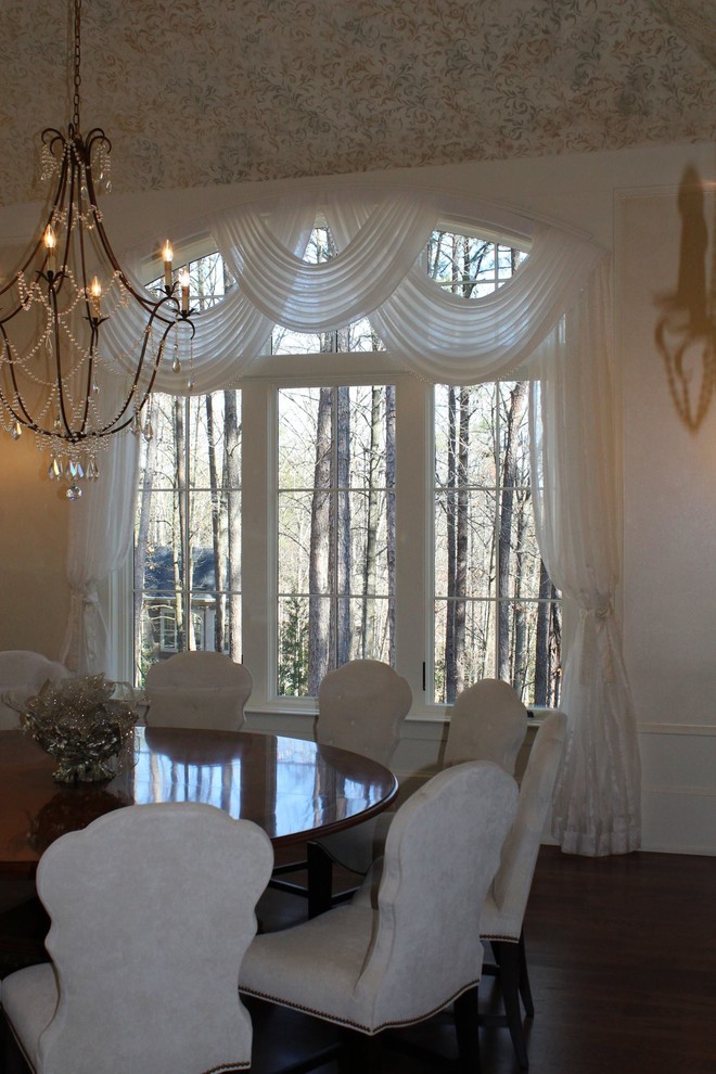 Photo of a small traditional separate dining room in Atlanta with white walls and no fireplace.