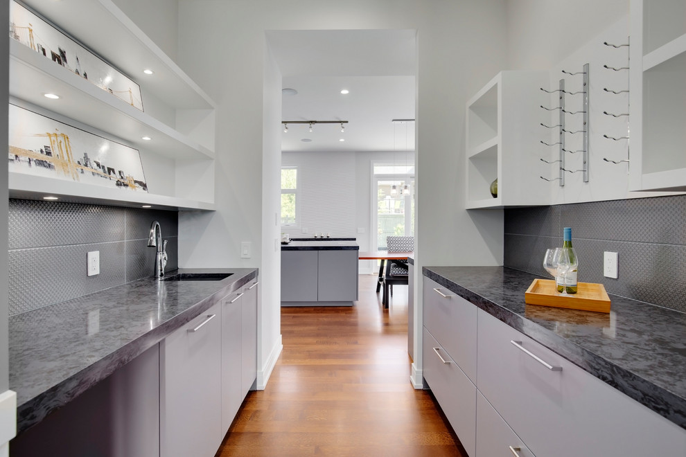 Transitional home design photo in Calgary