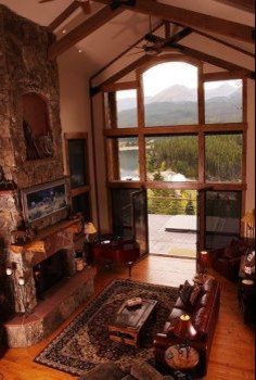 Example of a mountain style home design design in Orange County