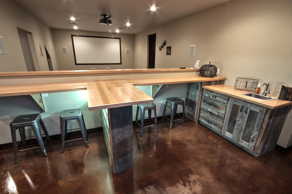 Mid-sized traditional u-shaped seated home bar in Other with an undermount sink, shaker cabinets, medium wood cabinets, wood benchtops and linoleum floors.