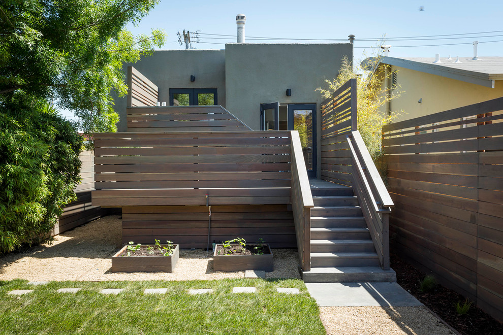 This is an example of a contemporary backyard deck in San Francisco.