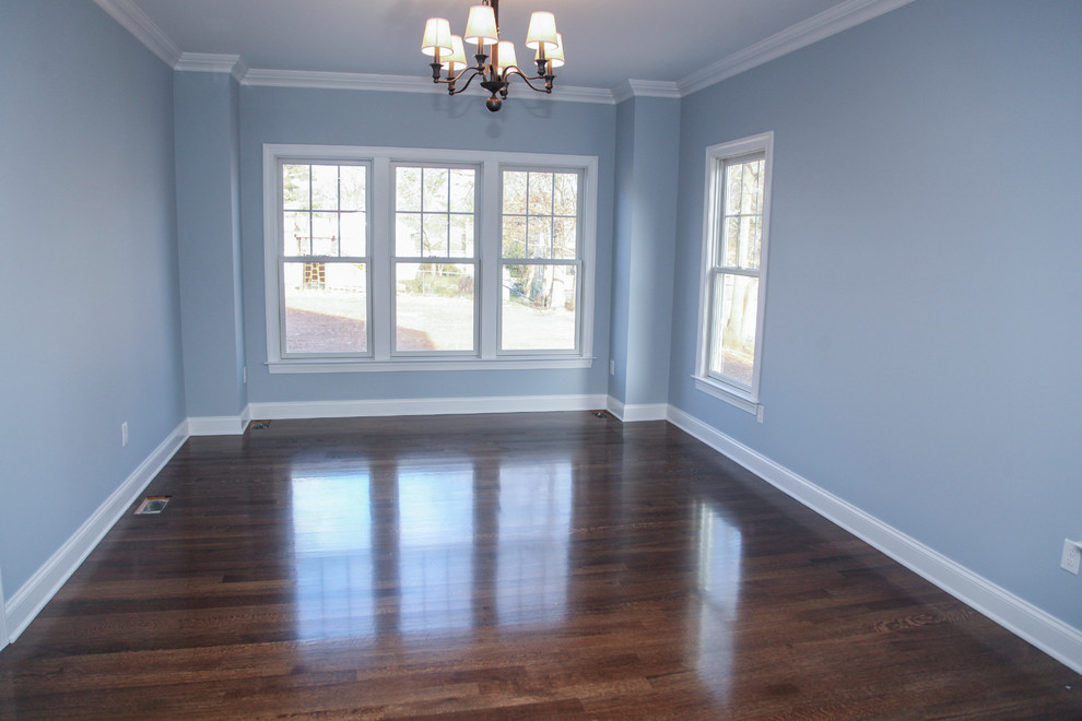 Mid-sized traditional separate dining room in Newark with blue walls and dark hardwood floors.