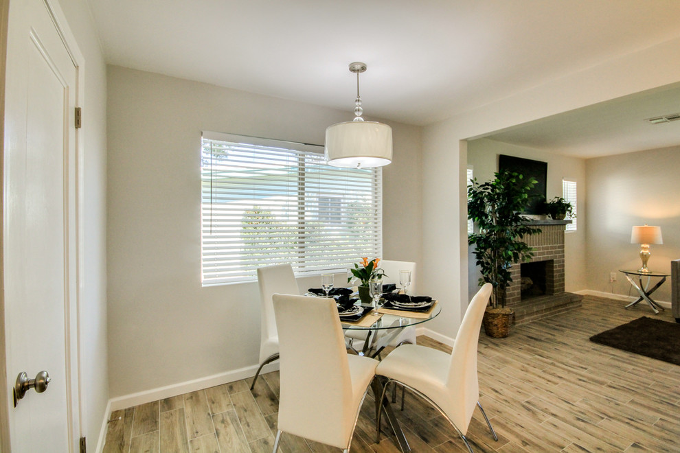 Example of a transitional dining room design in Phoenix