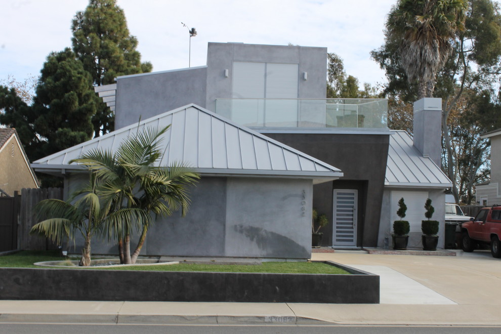 This is an example of a contemporary two-storey stucco exterior in Orange County.