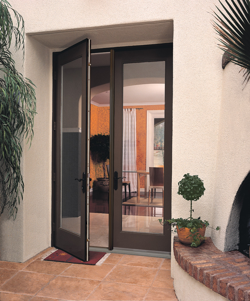 Design ideas for a mid-sized transitional front door in Phoenix with white walls, terra-cotta floors, a double front door and a black front door.