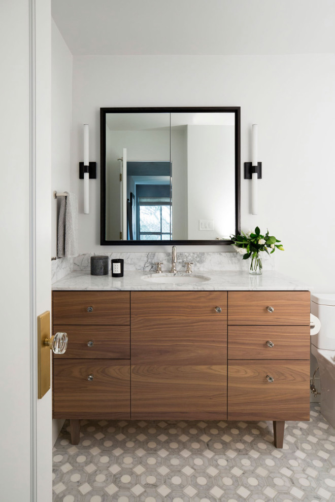 Inspiration for a mid-sized contemporary master bathroom in San Francisco with furniture-like cabinets, medium wood cabinets, an open shower, a two-piece toilet, white tile, terra-cotta tile, white walls, mosaic tile floors, an undermount sink, marble benchtops, grey floor, a hinged shower door, white benchtops, a single vanity and a freestanding vanity.