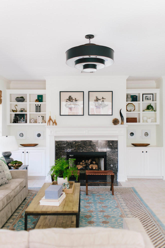 Living Room Design Dallas – Fireplace with Built-Ins & Balanced Styling | Lark I - Living room design in a Dallas home featuring a central fireplace with built-in shelving, layered decor, and neutral furnishings, creating a balanced, functional space with timeless appeal.