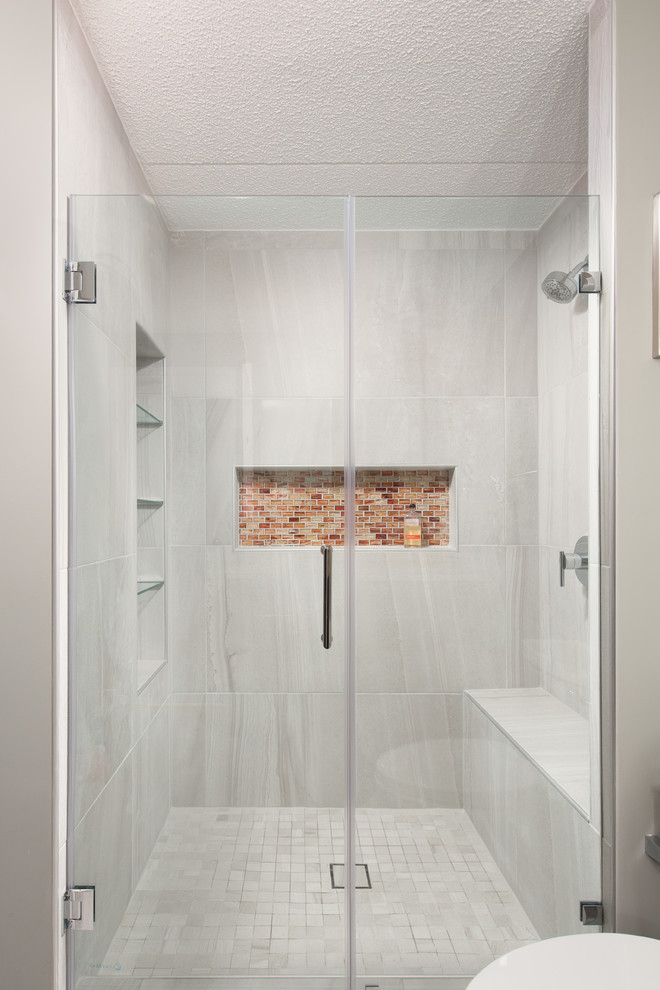 Design ideas for a mid-sized contemporary master bathroom in Chicago with flat-panel cabinets, dark wood cabinets, a curbless shower, a one-piece toilet, gray tile, stone tile, grey walls, ceramic floors, a drop-in sink and quartzite benchtops.