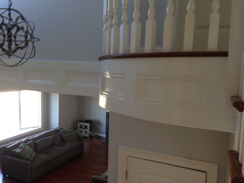 Transitional dark wood floor entryway photo