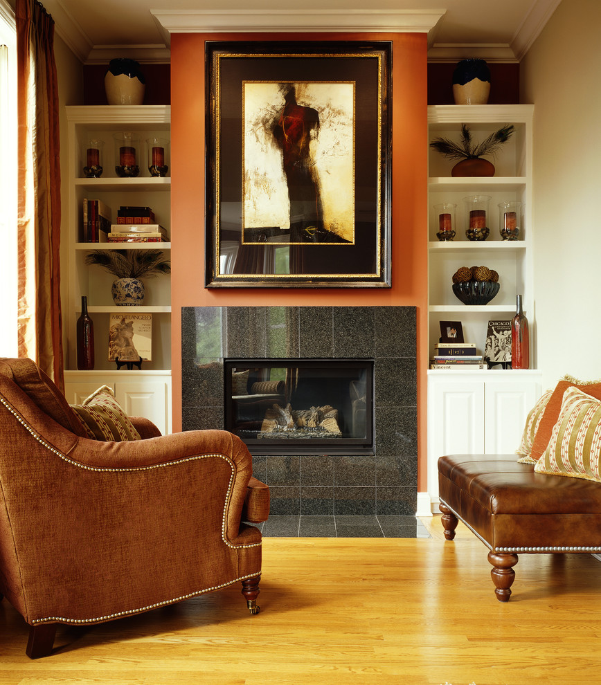 Contemporary living room in Chicago with a tile fireplace surround.