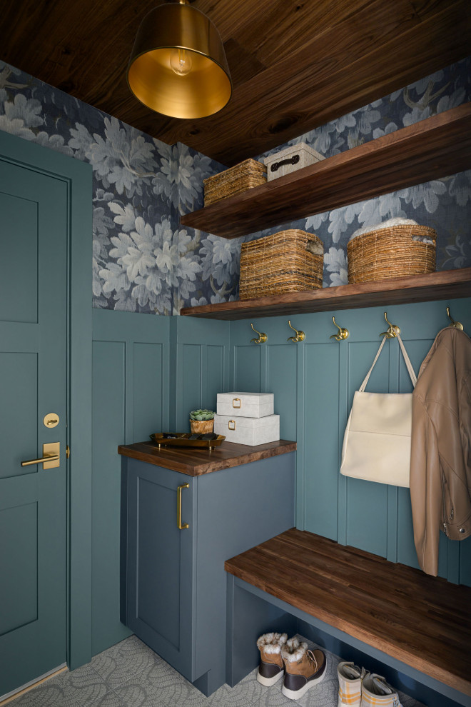 Mudroom - mid-sized transitional ceramic tile, gray floor, wood ceiling and wallpaper mudroom idea in Denver with blue walls and a blue front door