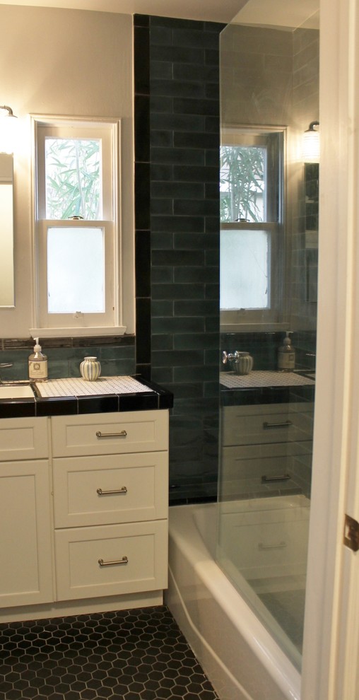 Example of a small transitional master white tile and ceramic tile ceramic tile bathroom design in Los Angeles with shaker cabinets, white cabinets, a two-piece toilet, gray walls, an undermount sink and tile countertops