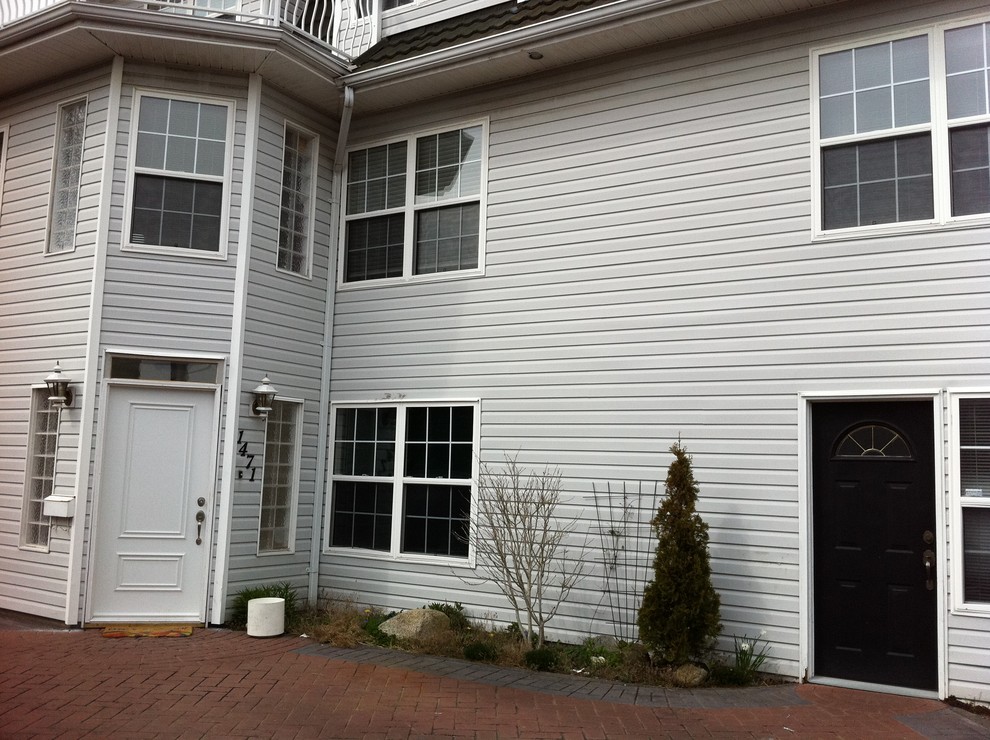 I need a design solution for an overhang for the front door without posts.