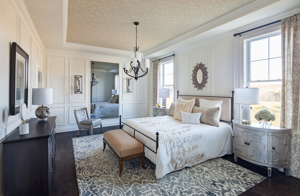 Design ideas for a large transitional master bedroom in DC Metro with white walls and dark hardwood floors.