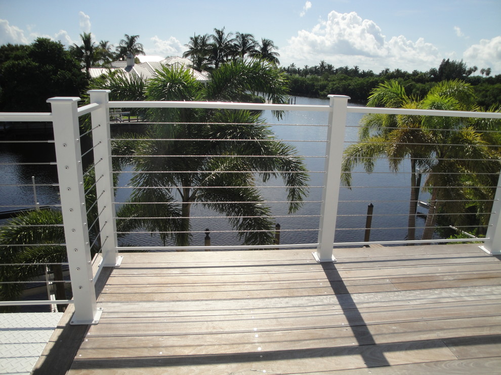 Design ideas for a large beach style rooftop deck in Miami with no cover.