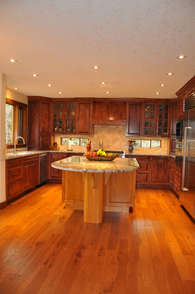 Example of a mountain style kitchen design in Calgary