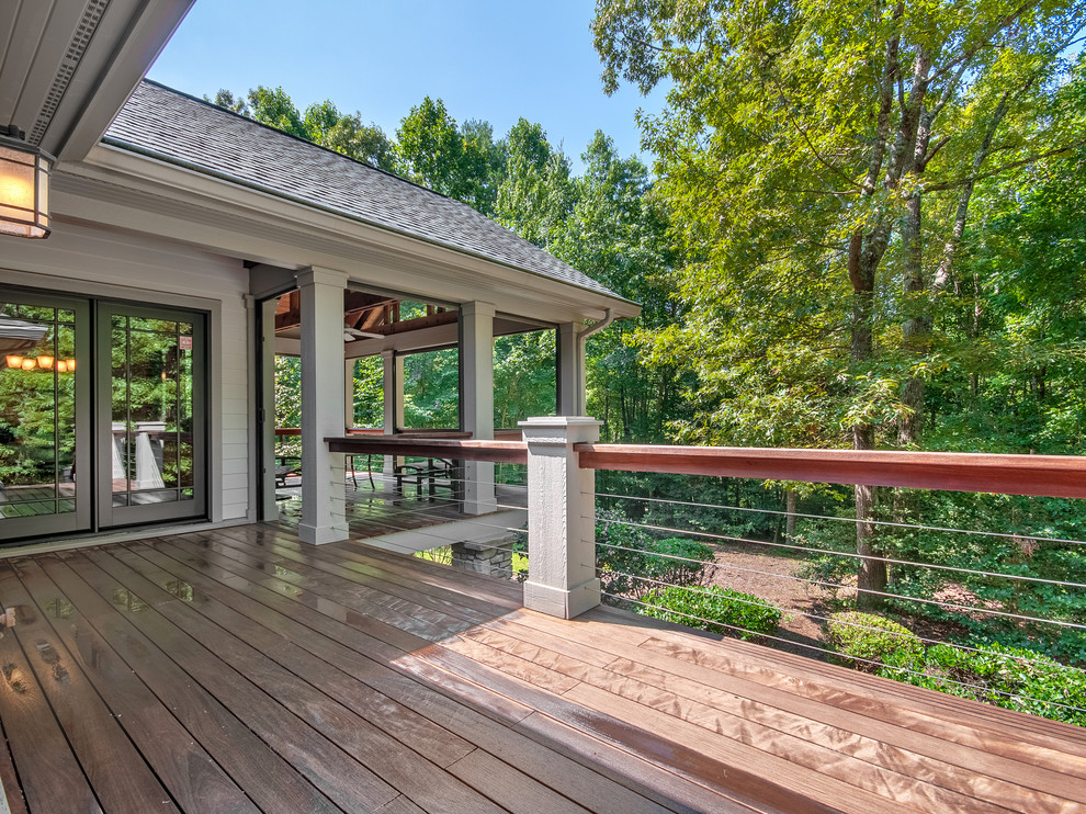 Deck - mid-sized craftsman backyard deck idea with no cover