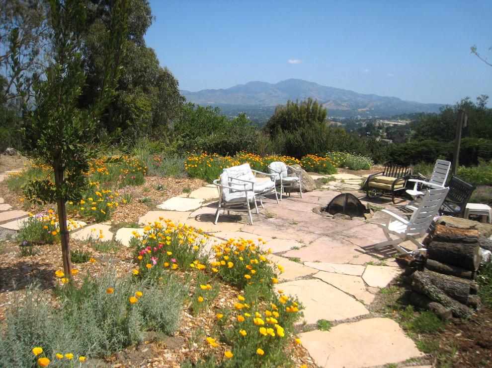 Inspiration for an eclectic patio in San Francisco with a fire feature.