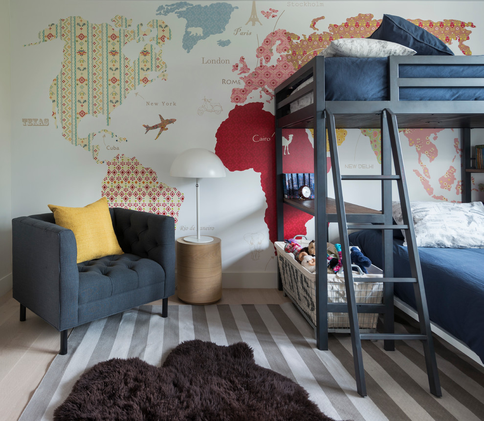 Transitional kids' bedroom in Boston with multi-coloured walls and light hardwood floors for boys.