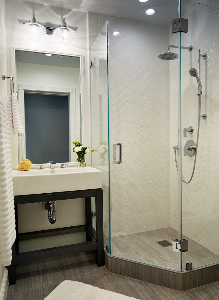This is an example of a mid-sized transitional 3/4 bathroom in San Francisco with a corner shower, white tile, porcelain tile, brown walls, porcelain floors, brown floor and a hinged shower door.