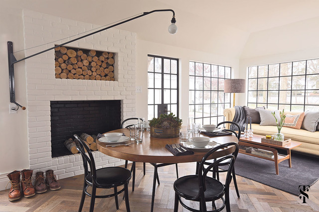 Country Club - french tudor renovation featured in Traditional Home magazine fusion-dining-room