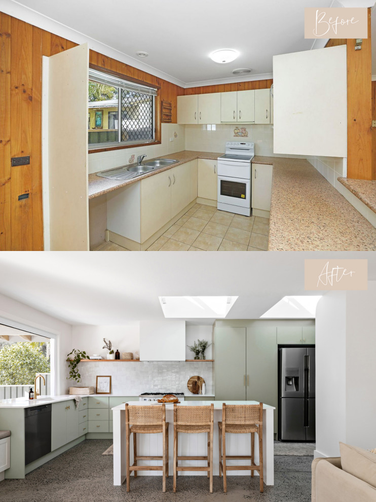 Inspiration for a mid-sized beach style l-shaped open plan kitchen in Central Coast with an undermount sink, flat-panel cabinets, green cabinets, quartz benchtops, white splashback, terra-cotta splashback, white appliances, concrete floors, with island, grey floor and white benchtop.