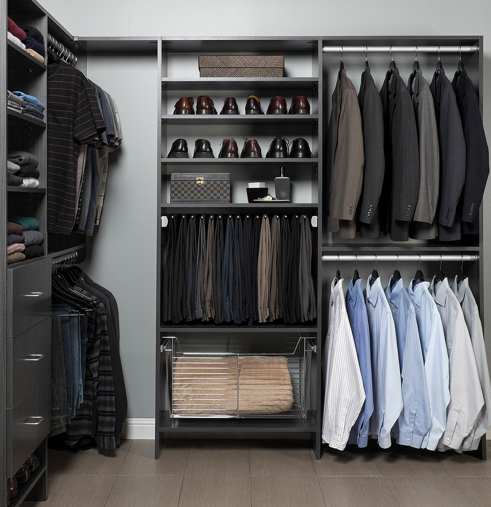 Inspiration for a mid-sized transitional men's walk-in wardrobe in Phoenix with flat-panel cabinets, grey cabinets and porcelain floors.