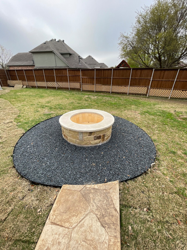 Photo of an expansive country backyard patio in Dallas with a fire feature, stamped concrete and a gazebo/cabana.