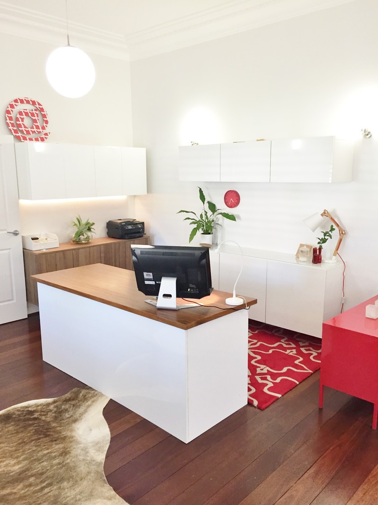 Mid-sized contemporary study room in Perth with grey walls and dark hardwood floors.