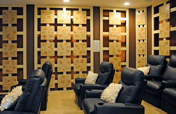 Inspiration for a modern enclosed home theatre in Orlando with brown walls, carpet and a projector screen.