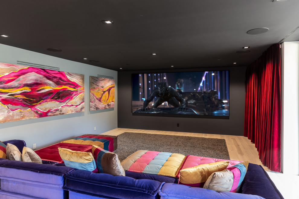 Photo of a contemporary home cinema in San Francisco with a feature wall.