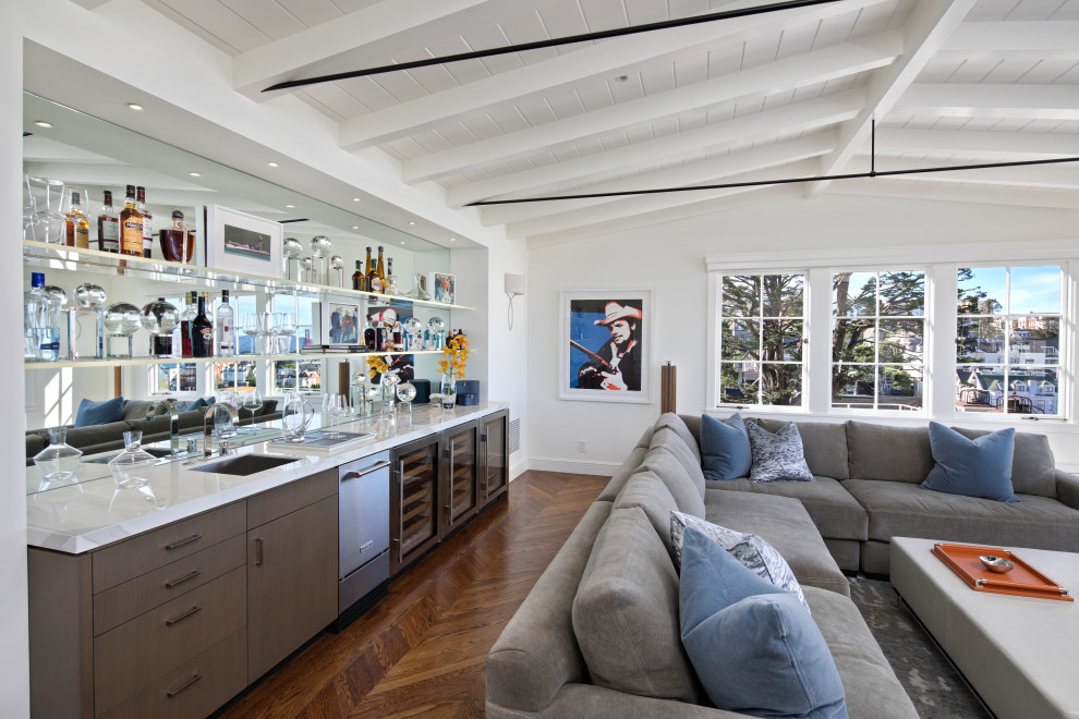 Inspiration for a large traditional enclosed family room in San Francisco with a home bar and medium hardwood floors.