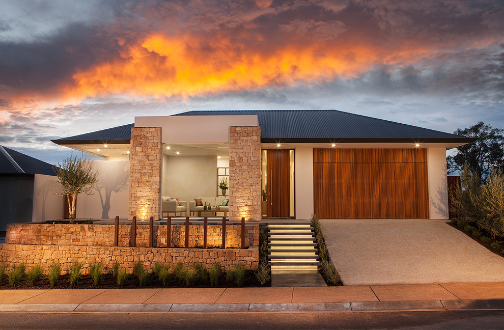 Design ideas for a contemporary one-storey white exterior in Adelaide with stone veneer and a hip roof.