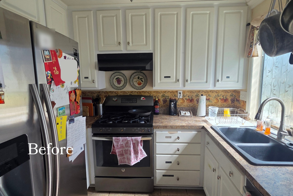 Eat-in kitchen - small transitional u-shaped travertine floor and beige floor eat-in kitchen idea in Orange County with a drop-in sink, raised-panel cabinets, white cabinets, granite countertops, white backsplash, stainless steel appliances, no island and brown countertops
