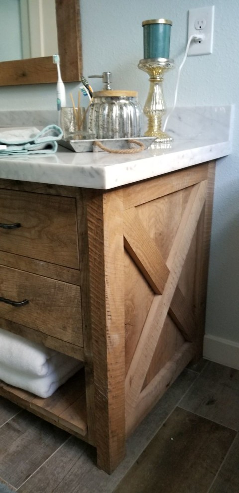 Inspiration for a small rustic 3/4 bathroom remodel in Houston