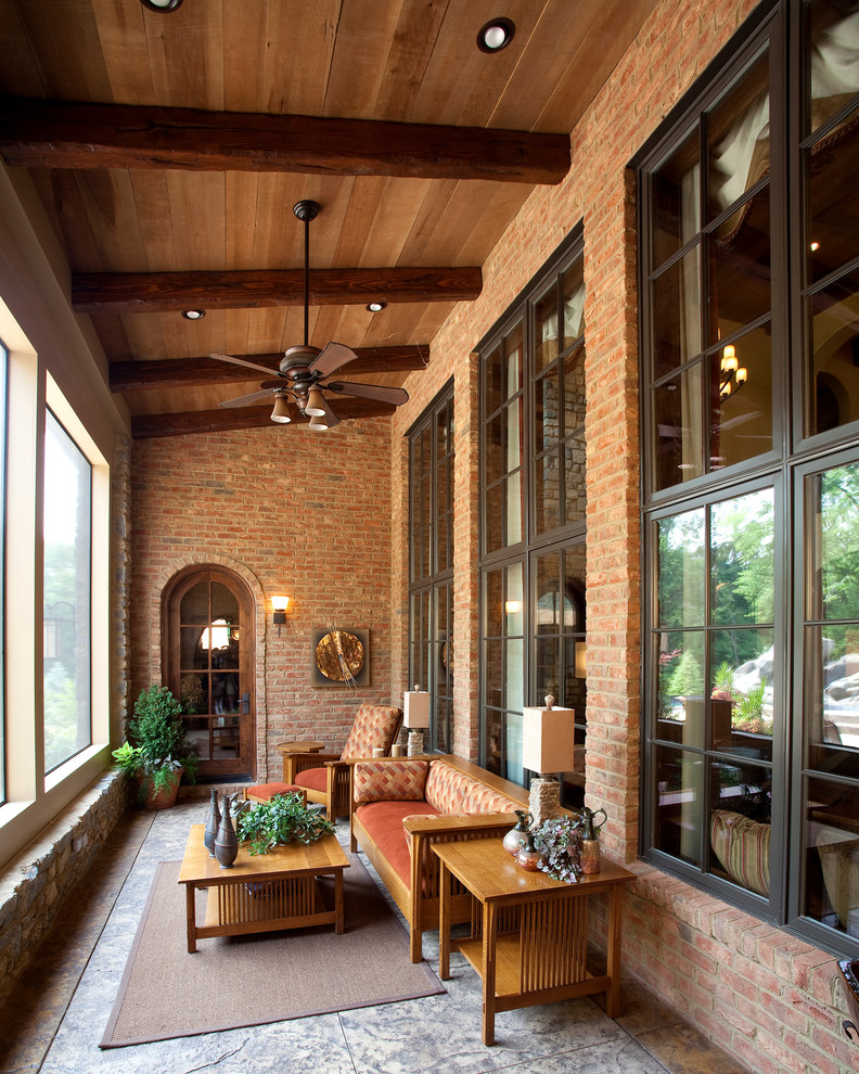 Inspiration for a traditional verandah in Cincinnati with a roof extension.