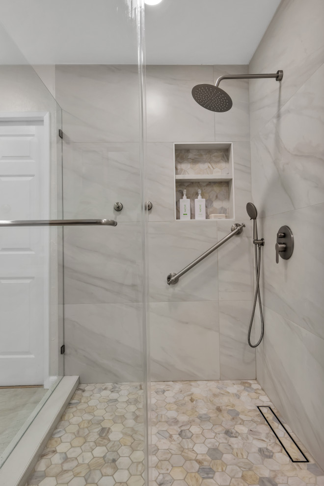 Small mid-century modern 3/4 gray tile and ceramic tile ceramic tile, multicolored floor, double-sink and brick wall alcove shower photo in Seattle with flat-panel cabinets, brown cabinets, a two-piece toilet, gray walls, an undermount sink, quartz countertops, a hinged shower door, white countertops and a floating vanity