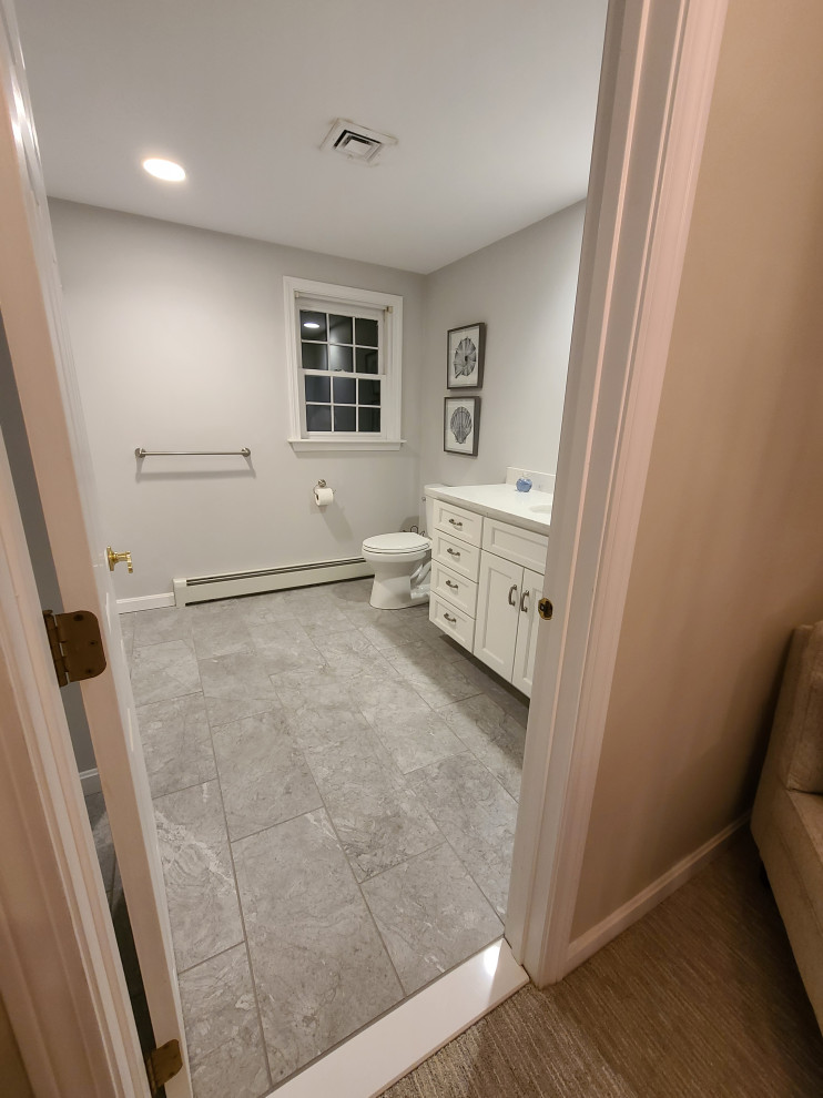 New tile, toilet, vanity & fixtures.