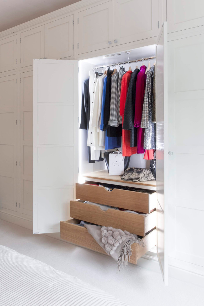This is an example of a modern storage and wardrobe in Gloucestershire with shaker cabinets.