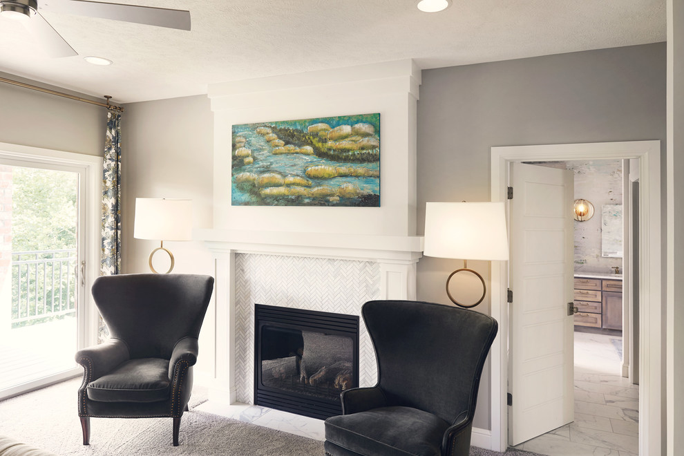 Inspiration for a huge rustic master carpeted and beige floor bedroom remodel with gray walls, a standard fireplace and a tile fireplace